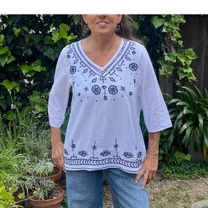 Chic Connection white cotton woman's peasant blouse with Navy embroidery.